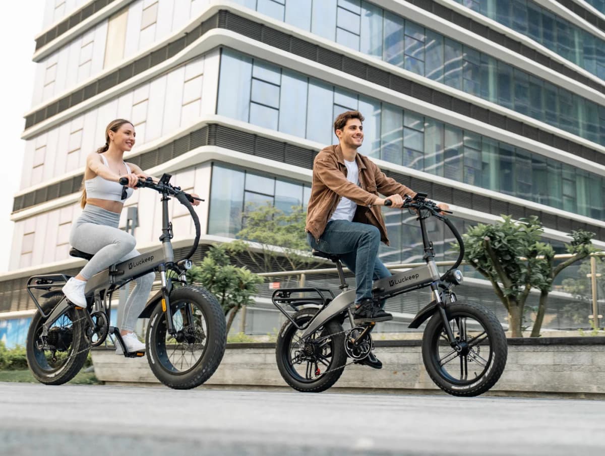 Person with Rivena e-bike by the river